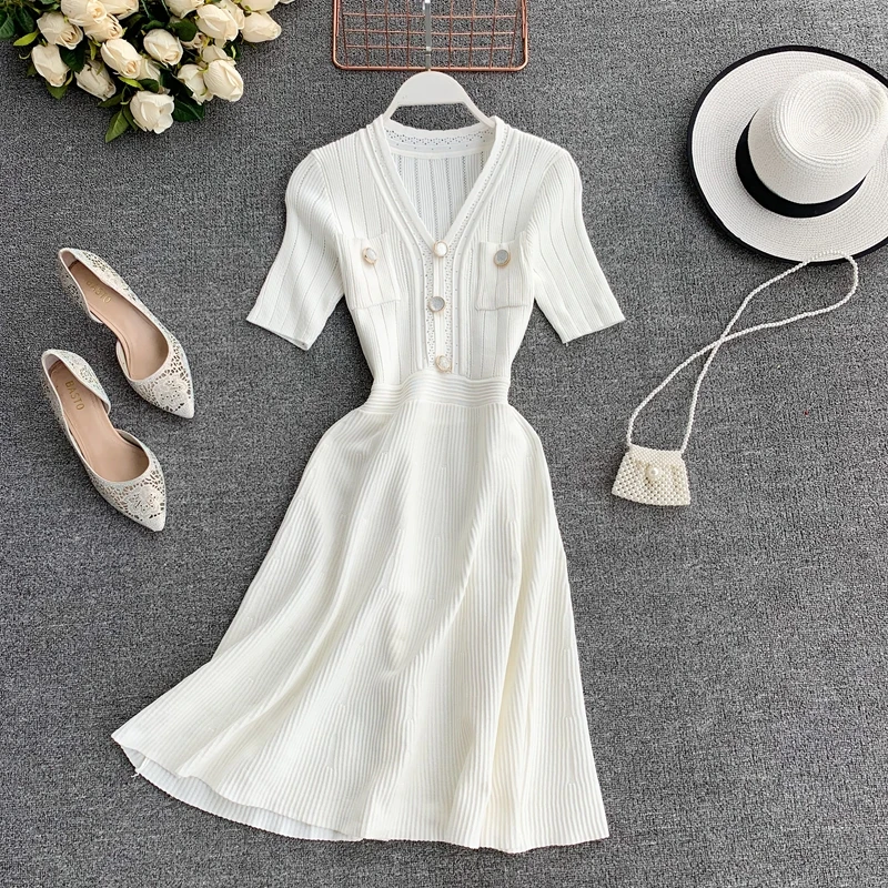 2019 summer autumn new women's v-collar single breasted pockets hollowed-out knitted short-sleeve dress female sweater dresses
2019 summer autumn new women's v-collar single breasted pockets hollowed-out knitted short-sleeve dress female sweater dresses