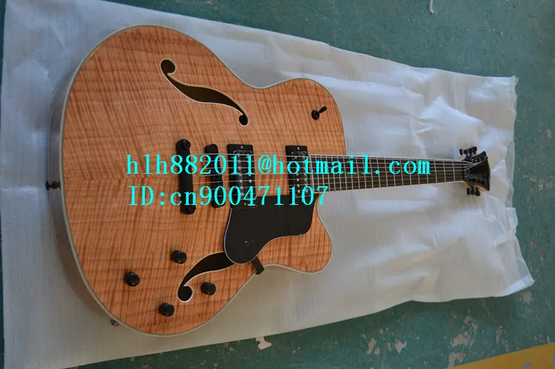 new Big John F hole 7 strings electric guitar with black hardware in natural made in China F-1853
new Big John F hole 7 strings electric guitar with black hardware in natural made in China F-1853