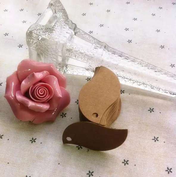 5 * 3 cm Creative leaf shape blank kraft paper tags jewelry price tags card tags with Hemp rope 1000 pcs/lot
5 * 3 cm Creative leaf shape blank kraft paper tags jewelry price tags card tags with Hemp rope 1000 pcs/lot