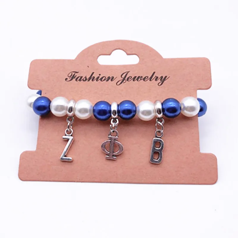 ZETA PHI BETA Sorority Charm Bracelet Greek Letters Blue/White Imitation Pearl Beads Handmade Elastic Bracelet & Bangles Jewelry
ZETA PHI BETA Sorority Charm Bracelet Greek Letters Blue/White Imitation Pearl Beads Handmade Elastic Bracelet & Bangles Jewelry