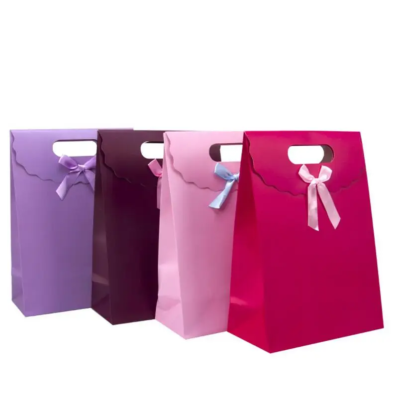 20pcs/lot Exquisite Paper Gift Bags with Ribobn Bow Wedding Birthday Party Gift Package Bags Christmas New Year Bags
20pcs/lot Exquisite Paper Gift Bags with Ribobn Bow Wedding Birthday Party Gift Package Bags Christmas New Year Bags
