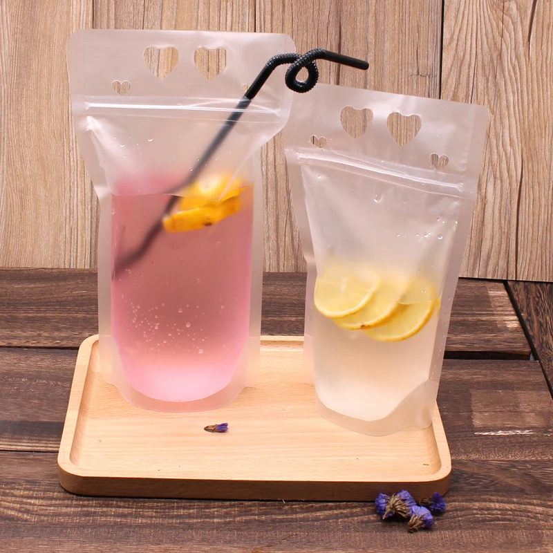 50pcs Transparent zip lock thick plastic bags 500ml juice milk tea coffee cold drink disposable packaging bags with handle
50pcs Transparent zip lock thick plastic bags 500ml juice milk tea coffee cold drink disposable packaging bags with handle