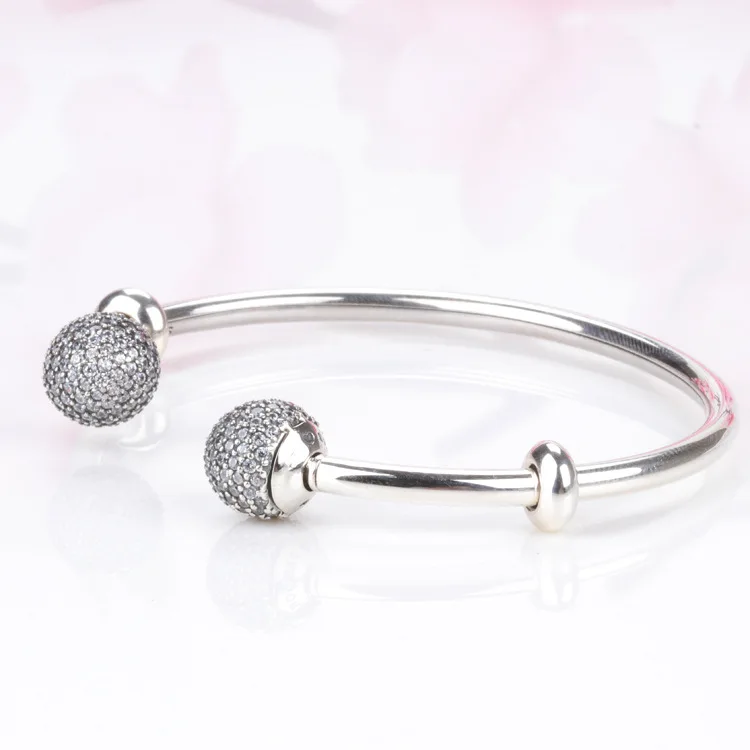 Top Quality MOMENTS Open Bangle Pave Caps WIth Cubic Zirconia Bangle Pan Bracelet Fit Bead Charm 925 Sterling Silver Jewelry
Top Quality MOMENTS Open Bangle Pave Caps WIth Cubic Zirconia Bangle Pan Bracelet Fit Bead Charm 925 Sterling Silver Jewelry