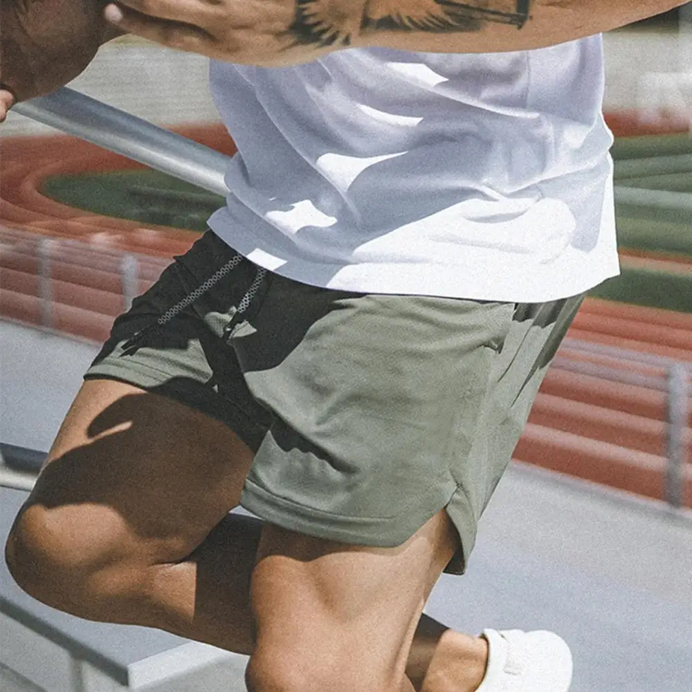 Men's 2 in 1 Running Shorts Fitness Quick Drying Training Bodybuilding Short Pants Gym Jogging Cycling Shorts with Longer Liner
Men's 2 in 1 Running Shorts Fitness Quick Drying Training Bodybuilding Short Pants Gym Jogging Cycling Shorts with Longer Liner