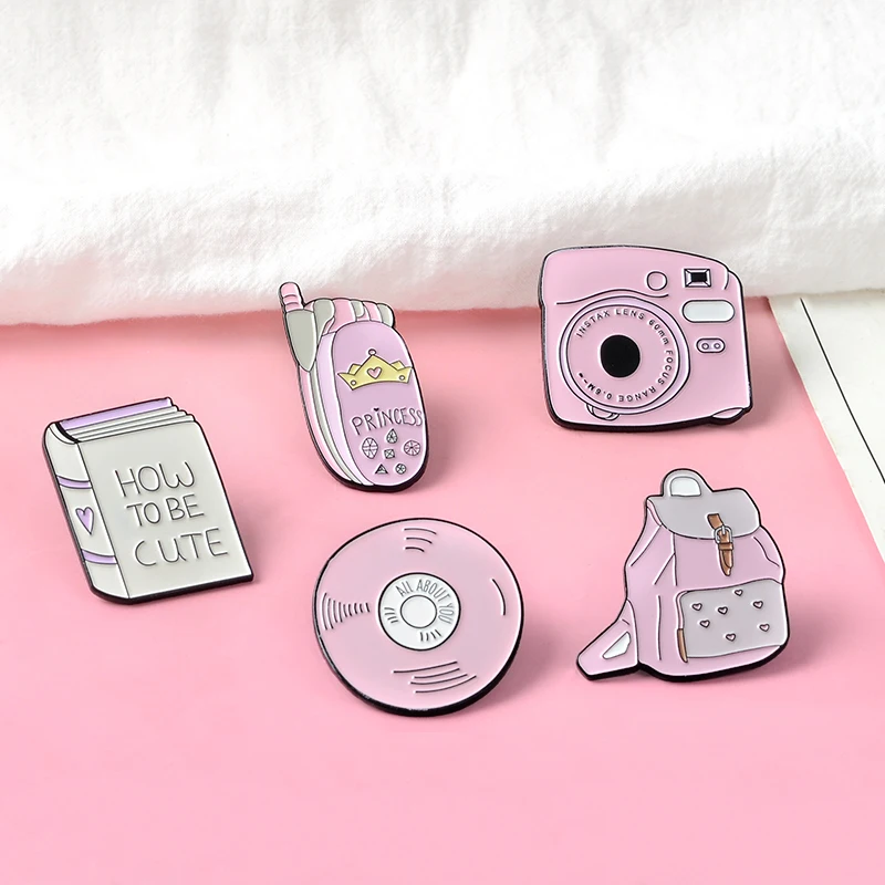 Cartoon Pink Daily Supplies Book Record Disc Polaroid mobile Phone brooches Bag Clothes Badge Enamel Lapel Pins for Cute Girls
Cartoon Pink Daily Supplies Book Record Disc Polaroid mobile Phone brooches Bag Clothes Badge Enamel Lapel Pins for Cute Girls