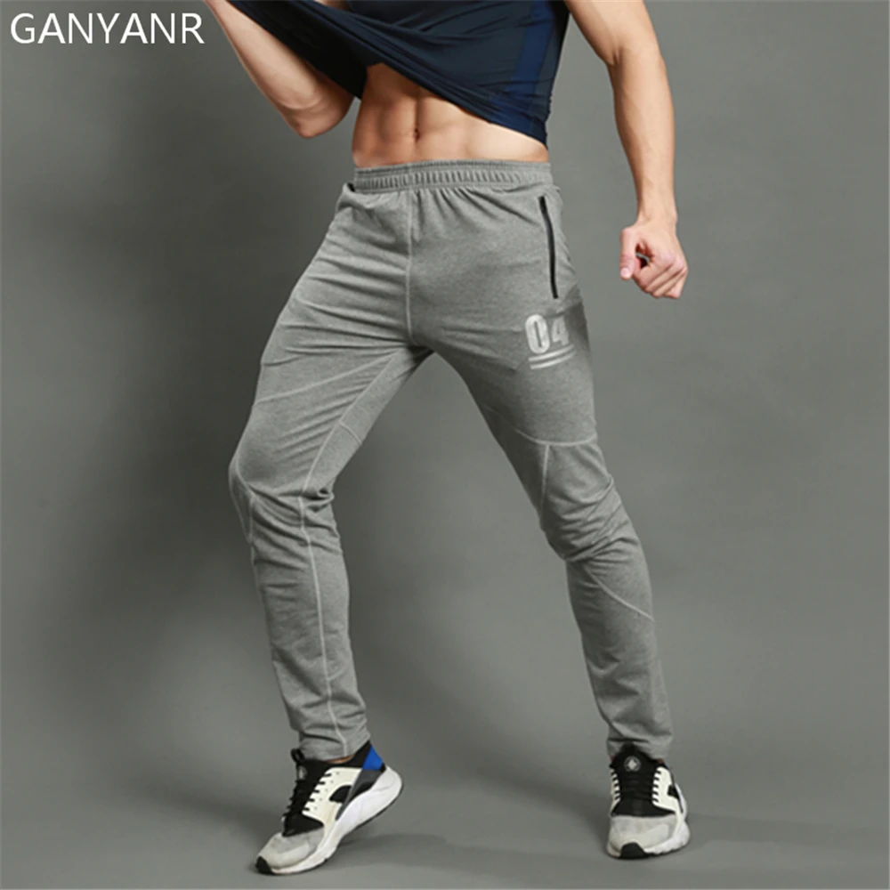 Image GANYANR Brand Men Running Pants Sportswear Fitness Legging Sports Football Sweatpants Gym Trousers Solid Polyester Training Long