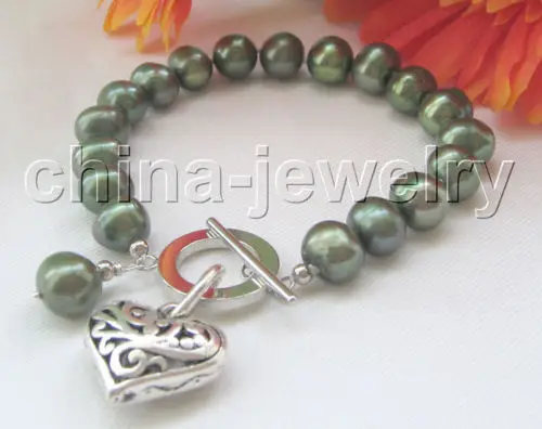 Beautiful 8" 10mm green round freshwater pearl bracelet-GP clasp @^Noble style Natural Fine jewe SHIPPING new >>free shipping
Beautiful 8" 10mm green round freshwater pearl bracelet-GP clasp @^Noble style Natural Fine jewe SHIPPING new >>free shipping
