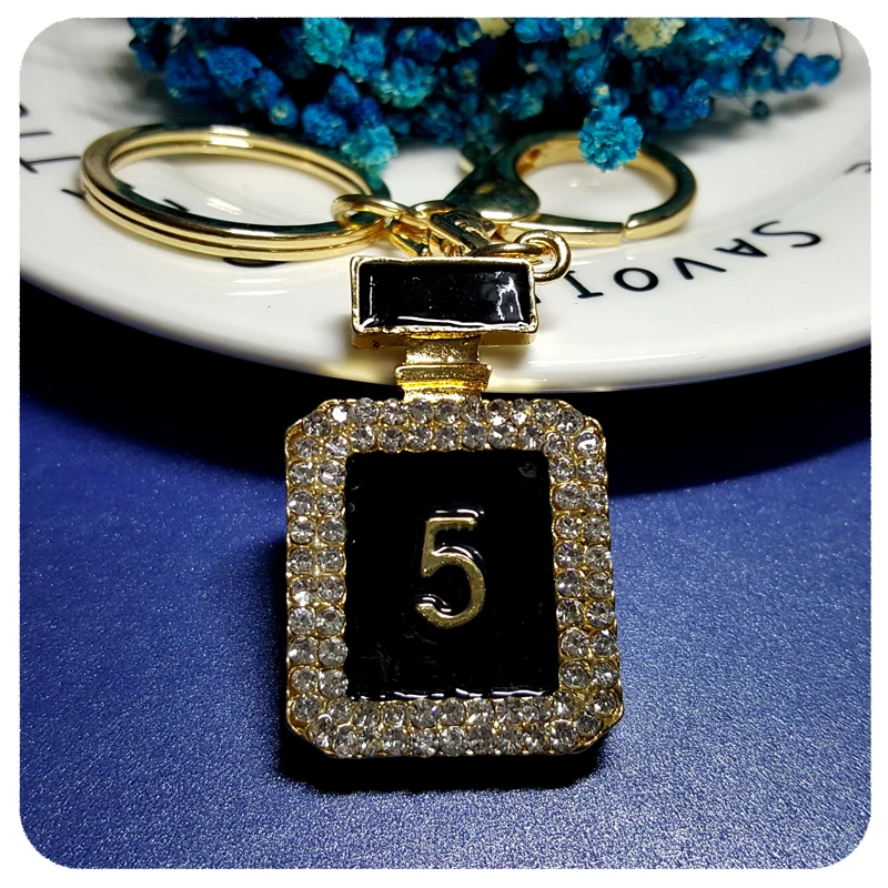 Brand Design Perfume Bottles Style Handbag Charm Accessory 3D Design Key Chain Ornament Gift
Brand Design Perfume Bottles Style Handbag Charm Accessory 3D Design Key Chain Ornament Gift