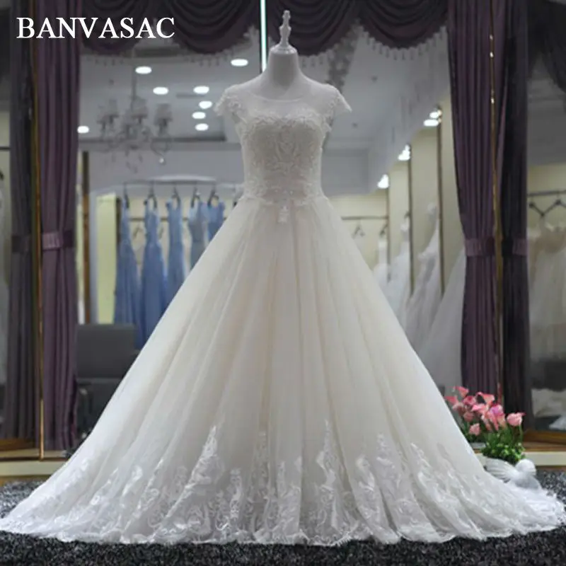 BANVASAC 2017 New Elegant Embroidery O Neck Wedding Dresses Short Sleeve Crystals Satin Sweep Train Lace Bridal Ball Gowns
BANVASAC 2017 New Elegant Embroidery O Neck Wedding Dresses Short Sleeve Crystals Satin Sweep Train Lace Bridal Ball Gowns