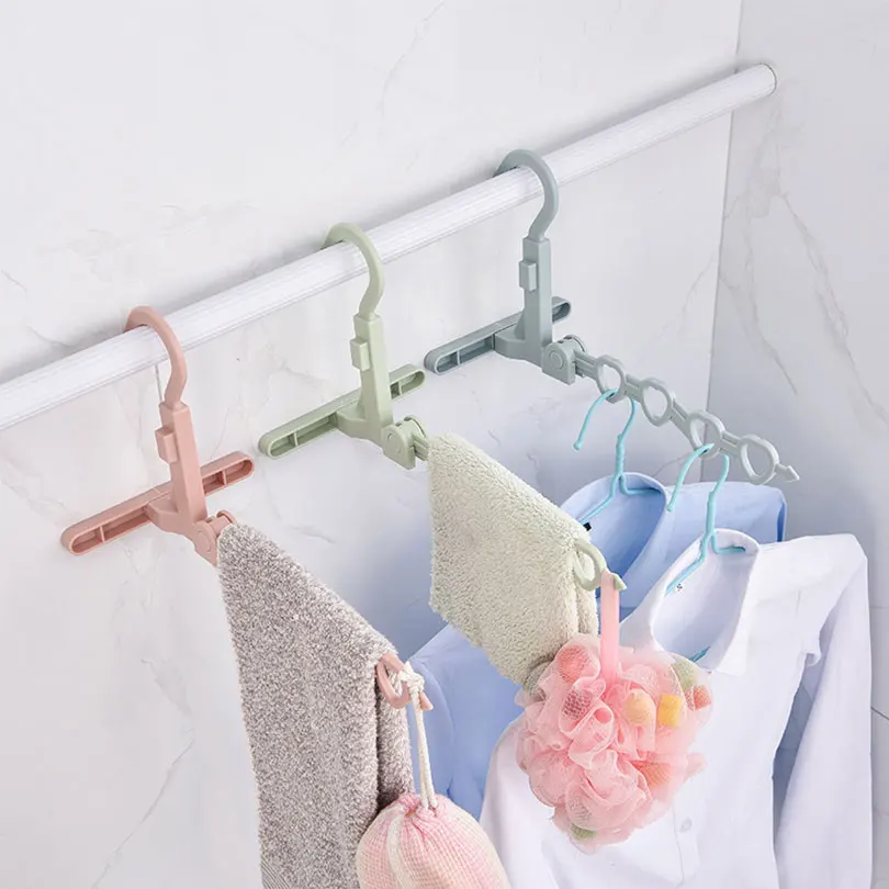 Portable Hanger 5-Hole Plastic Foldable Drying Rack Wall-Mounted Multi-Functional Travel Hanger Clothes Storage Racks EGA005
Portable Hanger 5-Hole Plastic Foldable Drying Rack Wall-Mounted Multi-Functional Travel Hanger Clothes Storage Racks EGA005