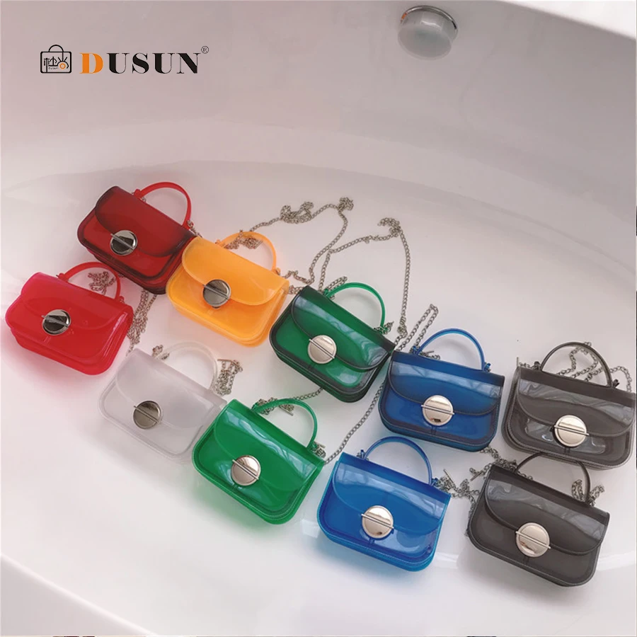 DUSUN Satchel Handbag Women Bag Clear Jelly Transparent PVC Bag Candy Color Tote Designer Mini Purse Bolsa Chains Crossbody Bag
DUSUN Satchel Handbag Women Bag Clear Jelly Transparent PVC Bag Candy Color Tote Designer Mini Purse Bolsa Chains Crossbody Bag