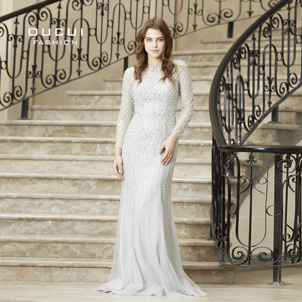 Real Photos Crystal Mermaid Long Sleeve Hand Made Illusion Full Beading Long Evening Dress Close Back Luxury OL103064B
Real Photos Crystal Mermaid Long Sleeve Hand Made Illusion Full Beading Long Evening Dress Close Back Luxury OL103064B