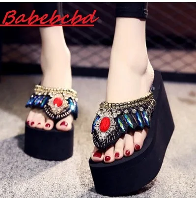 New summer high heel slippers ladies fashion hand drill flip-flops slippery slope with thick bottom beach slippers
New summer high heel slippers ladies fashion hand drill flip-flops slippery slope with thick bottom beach slippers