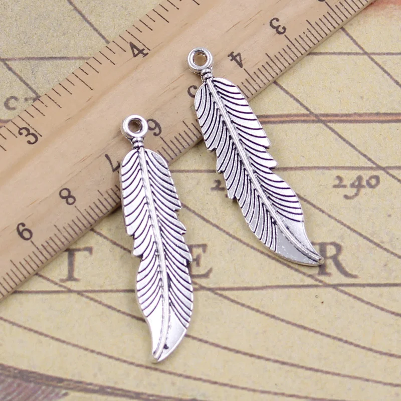 6pcs/lot Charms feathers tree leaf 45x11mm Tibetan Silver Pendants Crafts Making Findings Handmade Antique Jewelry DIY Necklace
6pcs/lot Charms feathers tree leaf 45x11mm Tibetan Silver Pendants Crafts Making Findings Handmade Antique Jewelry DIY Necklace