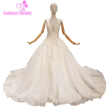 2018 New Luxury Sleeveless Lace Bead Scoop Cathedral Train Bridal Gowns Backless Ball Gown Cap Sleeve Vintage Wedding Dresses
2018 New Luxury Sleeveless Lace Bead Scoop Cathedral Train Bridal Gowns Backless Ball Gown Cap Sleeve Vintage Wedding Dresses