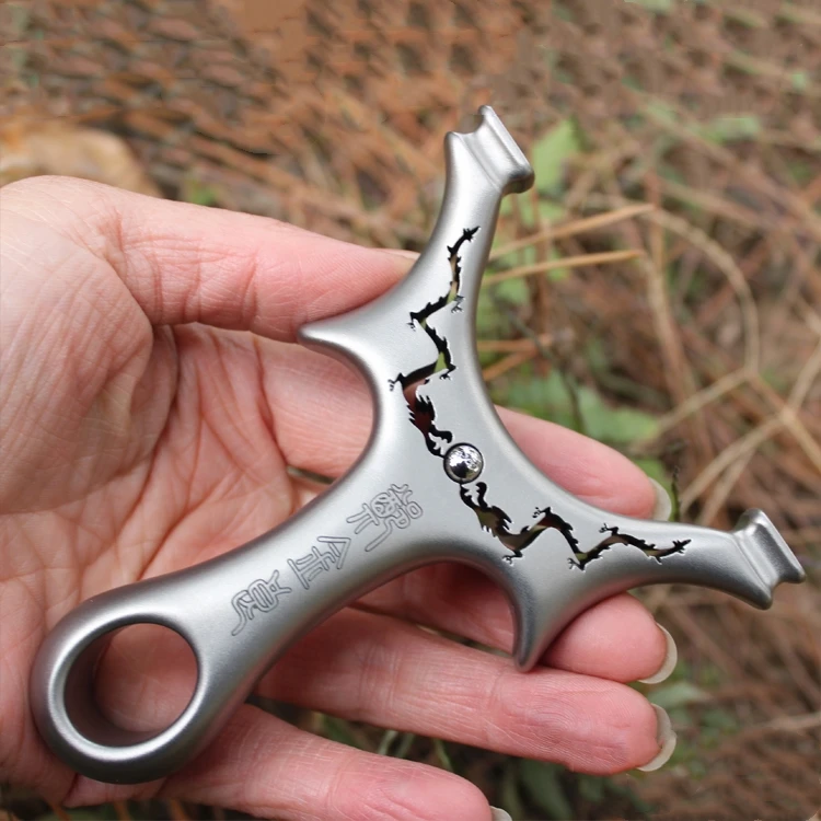 Slingshot hunting Titanium alloy slingshot flat rubber band outdoor shooting powerful hand-held bow new 2019
Slingshot hunting Titanium alloy slingshot flat rubber band outdoor shooting powerful hand-held bow new 2019