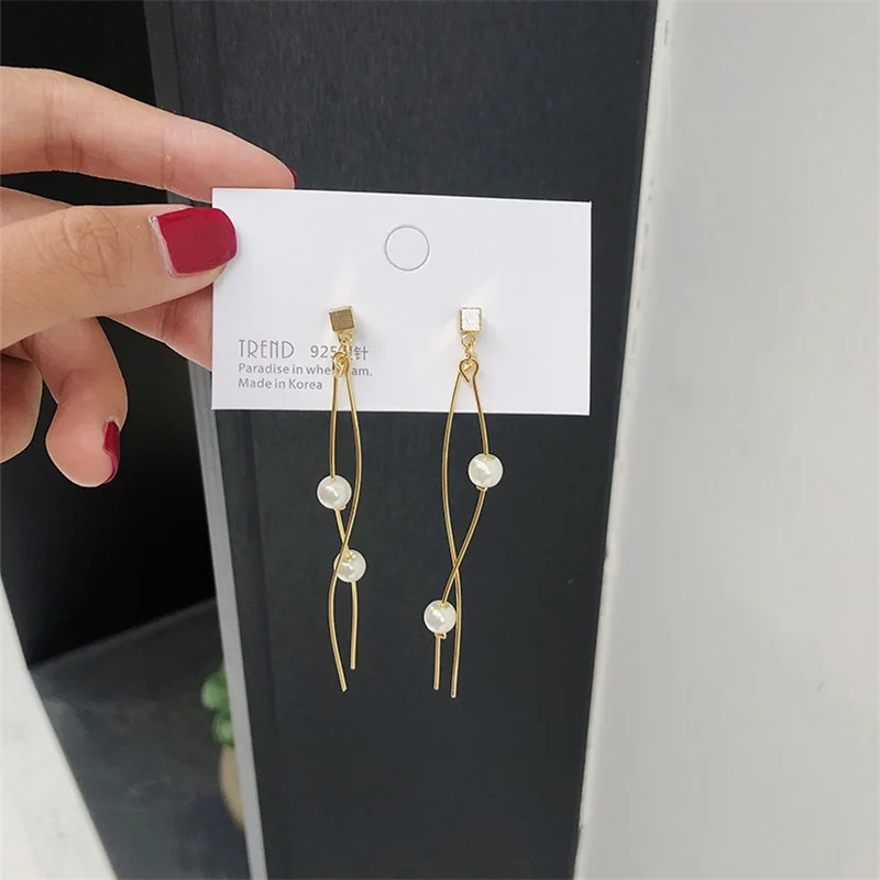 S925 silver needle earrings minimalist temperament streamlined earrings wild s-shaped pearl long section of smart earrings
S925 silver needle earrings minimalist temperament streamlined earrings wild s-shaped pearl long section of smart earrings