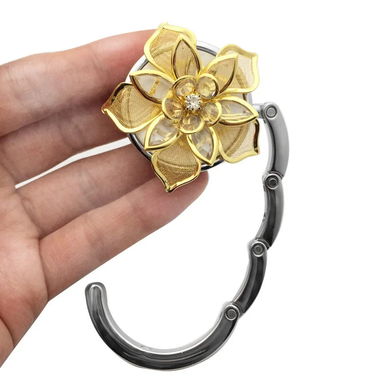 New Golden Flower Pattern Round Foldable Table Hook Hanger Storage Holder With Non-Slip Rubber Backing
New Golden Flower Pattern Round Foldable Table Hook Hanger Storage Holder With Non-Slip Rubber Backing