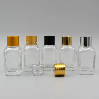 Beauty 20ml clear glass bottle with gold or silver cap , essential oil bottle square 20ml
Beauty 20ml clear glass bottle with gold or silver cap , essential oil bottle square 20ml