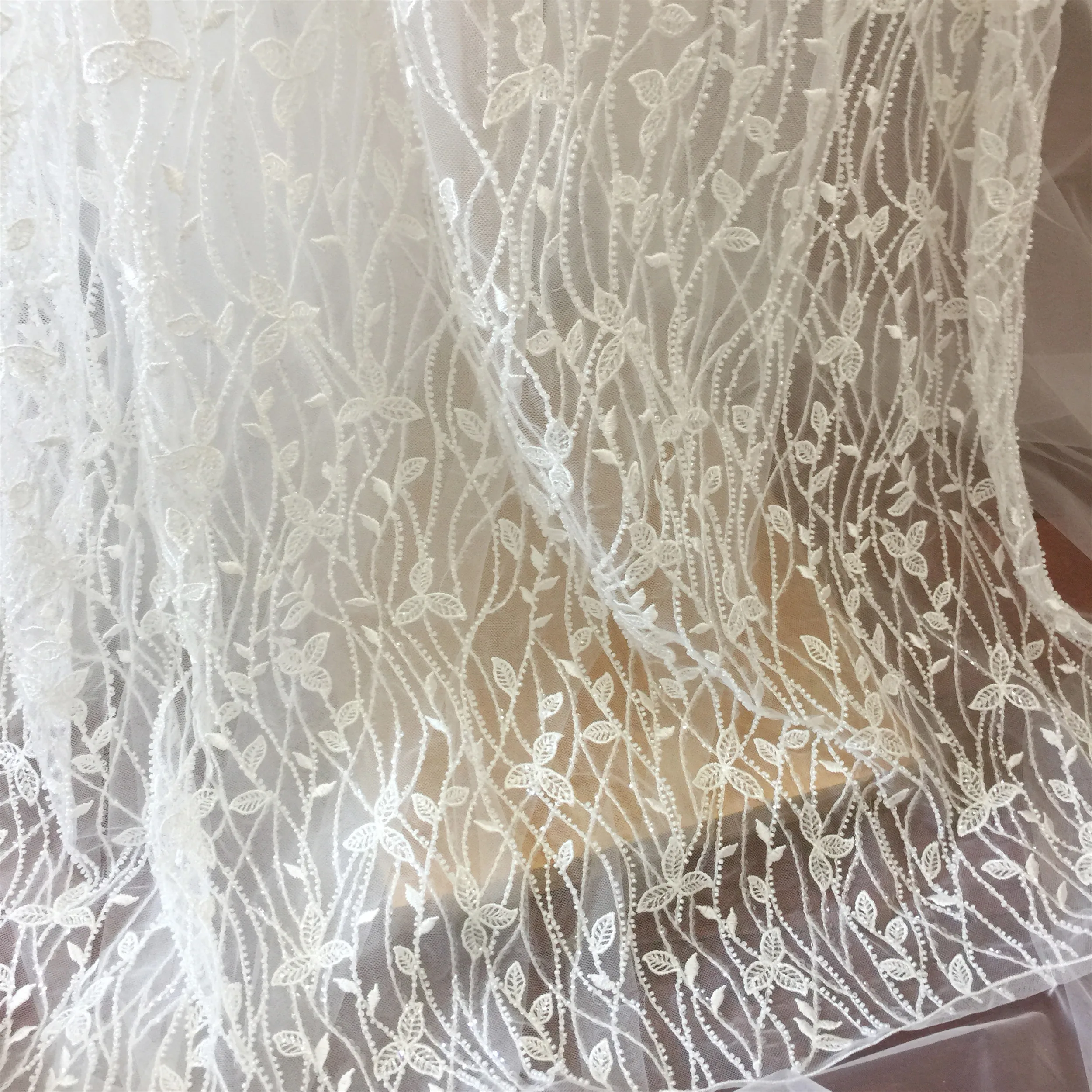 Luxury 3D Tiny Pearl Beading Tulle Lace Fabric 145cm wide , haute couture bridal gown wedding fabric lace by yard in off white
Luxury 3D Tiny Pearl Beading Tulle Lace Fabric 145cm wide , haute couture bridal gown wedding fabric lace by yard in off white