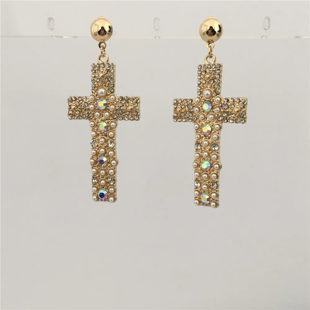 TRENDY GOLD COLOR PEARL CLEAR STONE INSERTED IRIDESCENCE CROSS SHINY DANGLE EARRING
TRENDY GOLD COLOR PEARL CLEAR STONE INSERTED IRIDESCENCE CROSS SHINY DANGLE EARRING