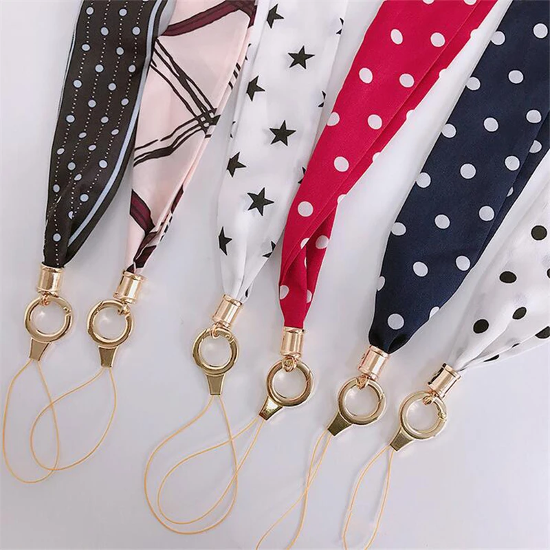 Fashion women's silk scarf cell phone lanyard temperament fresh fabric lanyard for keys phone strap neck strap
Fashion women's silk scarf cell phone lanyard temperament fresh fabric lanyard for keys phone strap neck strap