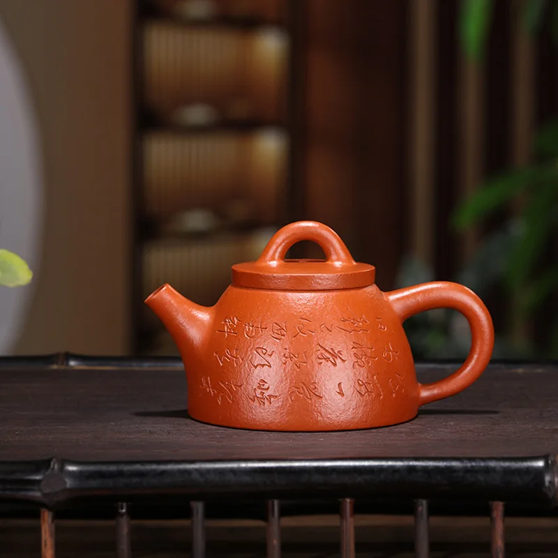 Yixing Dark-red Enameled Pottery Teapot Raw Ore Full Manual Crinkled Zhu Sha Ladle Pot Sketch
Yixing Dark-red Enameled Pottery Teapot Raw Ore Full Manual Crinkled Zhu Sha Ladle Pot Sketch