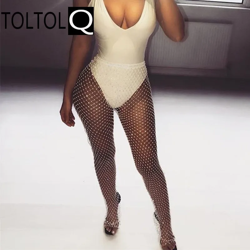 Women Crystal Diamonds Rhinestone Fishnet Sexy Tunic Full Length Pants Mesh Hollow Out See Through Club Party Beach Pants
Women Crystal Diamonds Rhinestone Fishnet Sexy Tunic Full Length Pants Mesh Hollow Out See Through Club Party Beach Pants