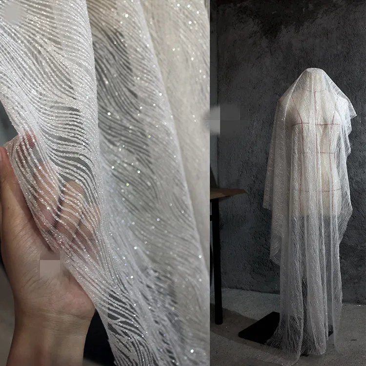45cm*145cm/piece Dreamcatcher mesh sequins ironing diamond perspective white mesh dress wedding dress designer fabrics
45cm*145cm/piece Dreamcatcher mesh sequins ironing diamond perspective white mesh dress wedding dress designer fabrics
