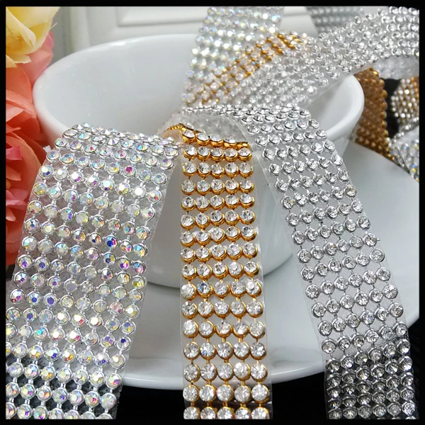 5 rows rhinestone trimming,1 piece/lot, fancy garment accessories colorful banding,hot fix glass banding trim,width about 1.7cm
5 rows rhinestone trimming,1 piece/lot, fancy garment accessories colorful banding,hot fix glass banding trim,width about 1.7cm