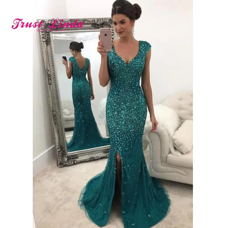 Luxury Mother Of The Bride Dresses Cap Sleeves V Neck Low Back Mermaid Crystal Beaded Evening Dress Side Slit Dinner Gowns
Luxury Mother Of The Bride Dresses Cap Sleeves V Neck Low Back Mermaid Crystal Beaded Evening Dress Side Slit Dinner Gowns