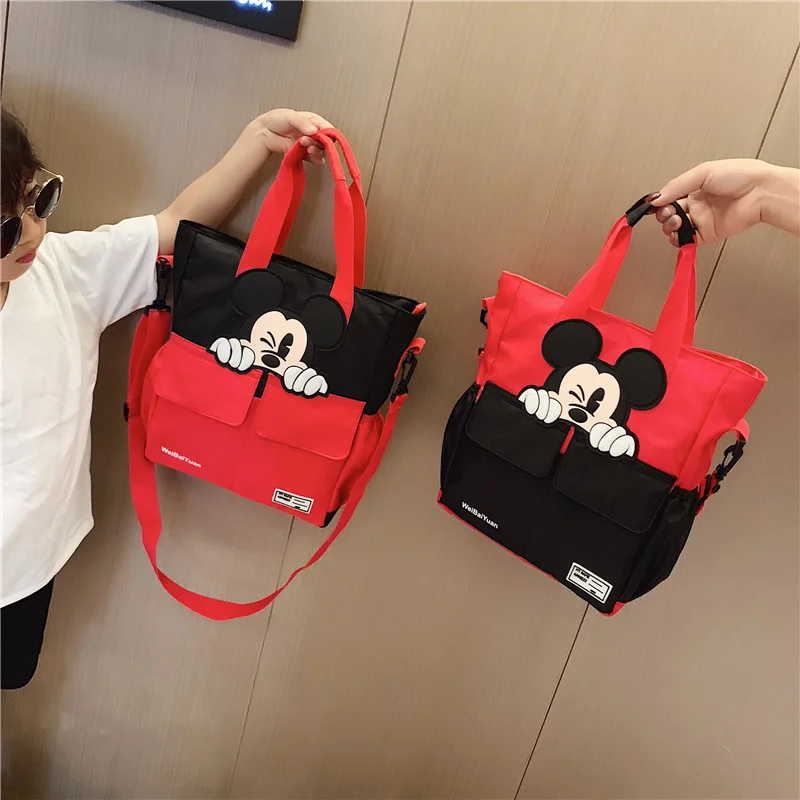 Disney new primary school tutor bag middle school student bag canvas children's supplementary school bag boys girls handbags
Disney new primary school tutor bag middle school student bag canvas children's supplementary school bag boys girls handbags