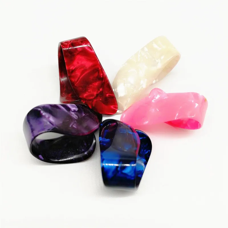 Fantastic Celluloid Material Marbled Pearl Thumb Guitar Picks in Various Colors 1.2mm/1.5mm Thickness
Fantastic Celluloid Material Marbled Pearl Thumb Guitar Picks in Various Colors 1.2mm/1.5mm Thickness