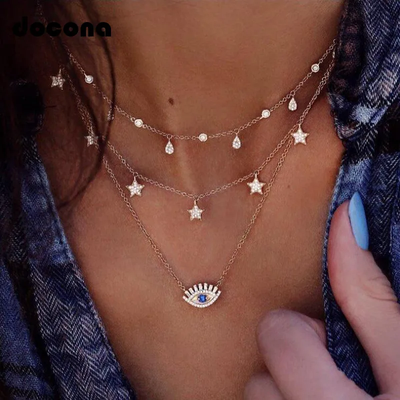 

Docona Boho Gold Color Crystal Star Eye Pendant Necklace for Women Girl Metal Charms Layered Necklace Collars 6384