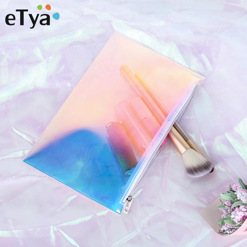 eTya Transparent PVC Cosmetic Bag Laser Waterproof Make Up Bags Portable Zipper Travel Wash Bag Clutch Toiletry Makeup Handbag
eTya Transparent PVC Cosmetic Bag Laser Waterproof Make Up Bags Portable Zipper Travel Wash Bag Clutch Toiletry Makeup Handbag