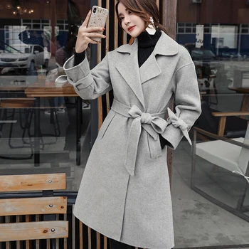 Winter new women's cashmere woolen coat V-neck tie high quality long wool fabric butterfly sleeve warm wild wild women's coat
Winter new women's cashmere woolen coat V-neck tie high quality long wool fabric butterfly sleeve warm wild wild women's coat