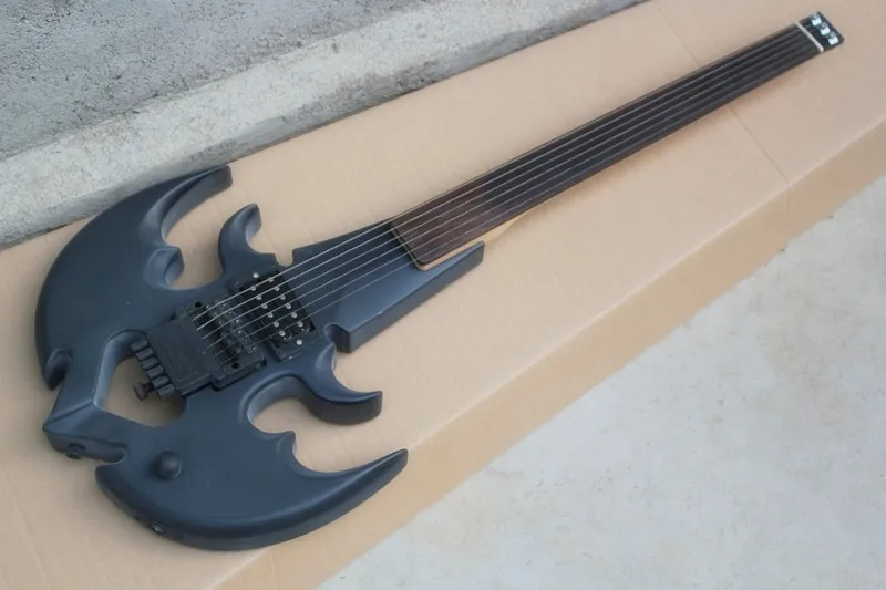 Factory wholesale matte black Anchor shape headless electric guitar without frets/inlay,Tremolo system,Rosewood fretboard
Factory wholesale matte black Anchor shape headless electric guitar without frets/inlay,Tremolo system,Rosewood fretboard