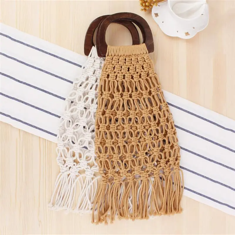 Handmade Woven Wooden Handle Handbag Hollow Cotton String Tassel Beach Bag for Women Mesh Straw Totes Fashion Shoulder Bag
Handmade Woven Wooden Handle Handbag Hollow Cotton String Tassel Beach Bag for Women Mesh Straw Totes Fashion Shoulder Bag