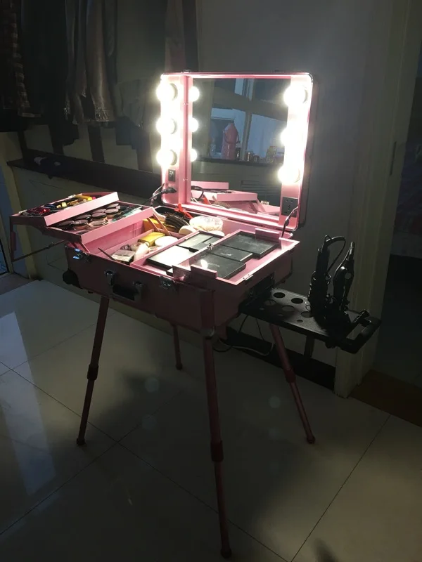 Rolling Studio Makeup Artist Cosmetic Case with Light Bulb Adjustable Leg Mirror Cosmetic Black Train Table
Rolling Studio Makeup Artist Cosmetic Case with Light Bulb Adjustable Leg Mirror Cosmetic Black Train Table