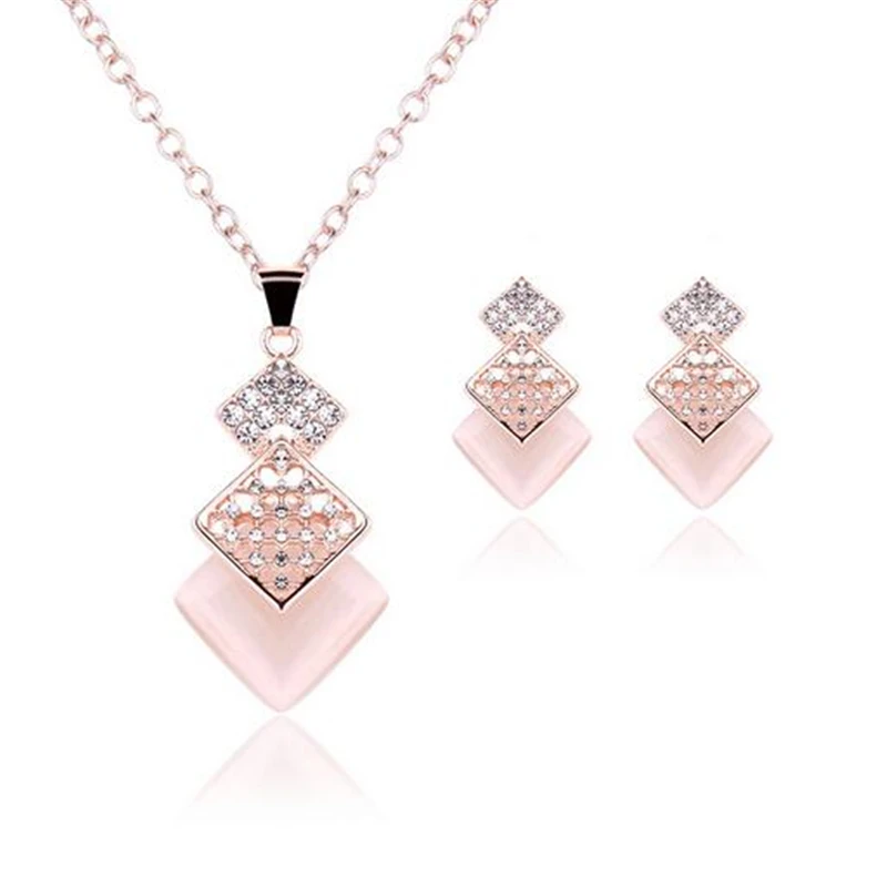 Fashion Gold Color Jewelry Sets Pink Natural Stone Crystal Beads Geometric Pendant Necklace Earrings Sets Women Wedding Party
Fashion Gold Color Jewelry Sets Pink Natural Stone Crystal Beads Geometric Pendant Necklace Earrings Sets Women Wedding Party