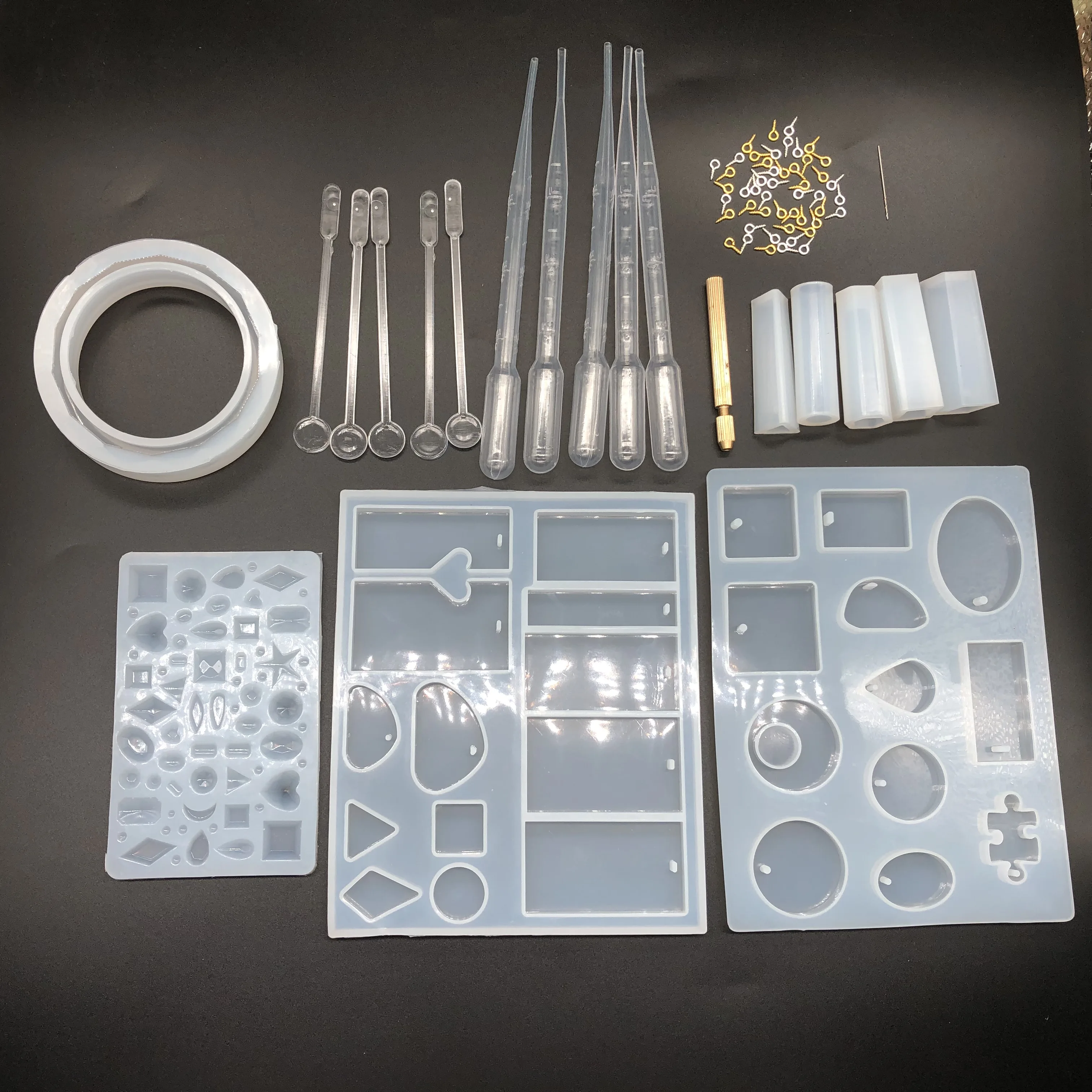 62pcs/set Pendant Bracelet Jewelry Casting Molds Silicone Resin Jewelry Molds Set For DIY Pendant Earrings Jewelry Making Tool
62pcs/set Pendant Bracelet Jewelry Casting Molds Silicone Resin Jewelry Molds Set For DIY Pendant Earrings Jewelry Making Tool