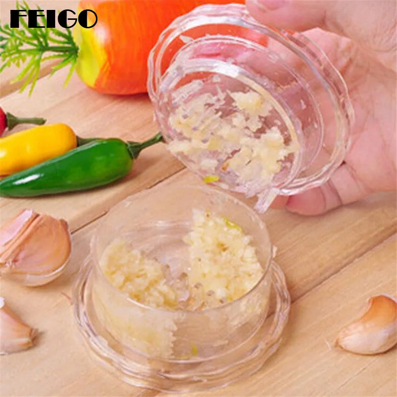 FEIGO Multi-Usage Garlic Chopper Press Peeler Slicer Cutter Nuts Ginger Spice Mincer Stirrer Presser Kitchen egetable Tools F659
FEIGO Multi-Usage Garlic Chopper Press Peeler Slicer Cutter Nuts Ginger Spice Mincer Stirrer Presser Kitchen egetable Tools F659