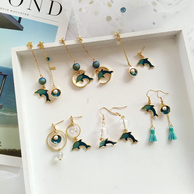 Hot Selling Whale pearl shell Pendant Earrings For Women Fashion Gold color Cute animal Pendant Earrings Girls Charm Ear Jewelry
Hot Selling Whale pearl shell Pendant Earrings For Women Fashion Gold color Cute animal Pendant Earrings Girls Charm Ear Jewelry