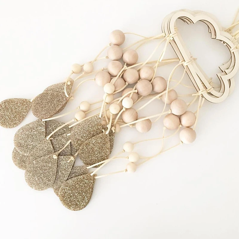 Hanging drop hollow cloud rain drops planet wood pendant hanging curtain Nordic style children 's room wall ornaments
Hanging drop hollow cloud rain drops planet wood pendant hanging curtain Nordic style children 's room wall ornaments