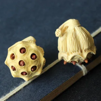 Fine wood carving seedpod of the lotus, boxwood, carved jewelry accessories pendants wooden handicrafts(A338)
Fine wood carving seedpod of the lotus, boxwood, carved jewelry accessories pendants wooden handicrafts(A338)