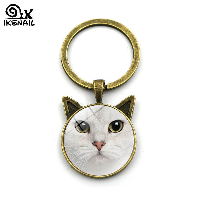 IKSNAIL Fashion Cat Face Time Gemstone Keychains Retro Cat Ear DIY Metal Key Rings Car Cabochon Pendant for Women Men Key Chain
IKSNAIL Fashion Cat Face Time Gemstone Keychains Retro Cat Ear DIY Metal Key Rings Car Cabochon Pendant for Women Men Key Chain