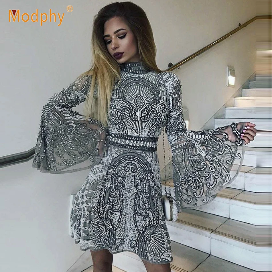 2019 spring new high quality sequin dress long sleeve high collar A word mini dress celebrity show catwalk party dress Vestidos
2019 spring new high quality sequin dress long sleeve high collar A word mini dress celebrity show catwalk party dress Vestidos