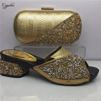Hot sale gold with stones design African slipper pump shoes and purse bag set for lady GY5, heel height 5cm
Hot sale gold with stones design African slipper pump shoes and purse bag set for lady GY5, heel height 5cm