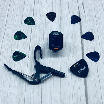 2018 NEW Super Value Tool Kit Guitar Tuner + Capo + Plectrum Holder + 7 Colors Picks Guitarra Parts Accessories
2018 NEW Super Value Tool Kit Guitar Tuner + Capo + Plectrum Holder + 7 Colors Picks Guitarra Parts Accessories