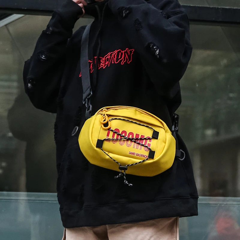 Street trend men's Korean version of the Messenger bag letter shoulder bag personality tide take Hip hop package party small bag
Street trend men's Korean version of the Messenger bag letter shoulder bag personality tide take Hip hop package party small bag